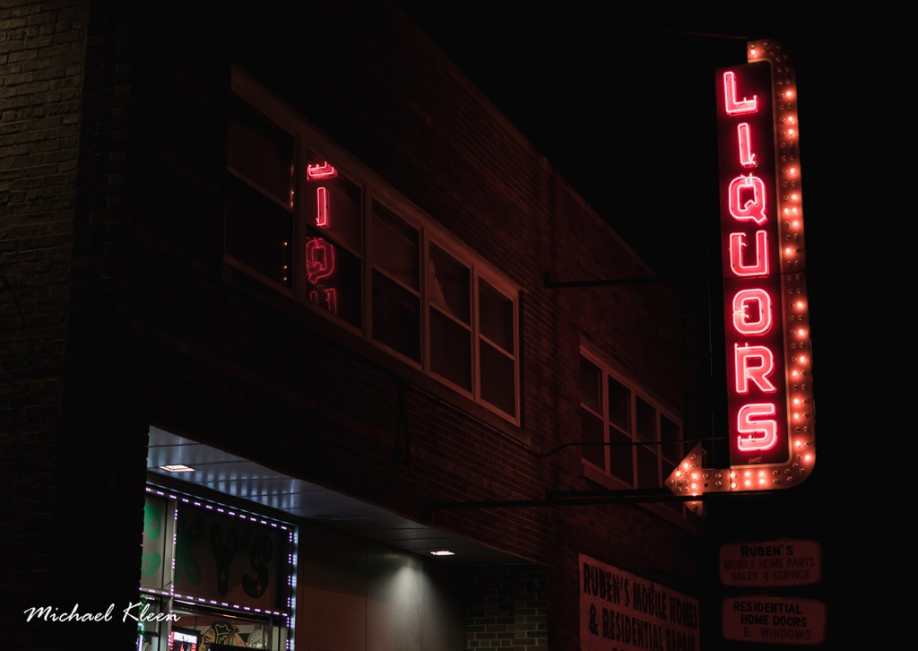 Neon sign for Packy's Wine & Liquors, 1440 E. Oakton Street, in Des Plaines, Illinois.