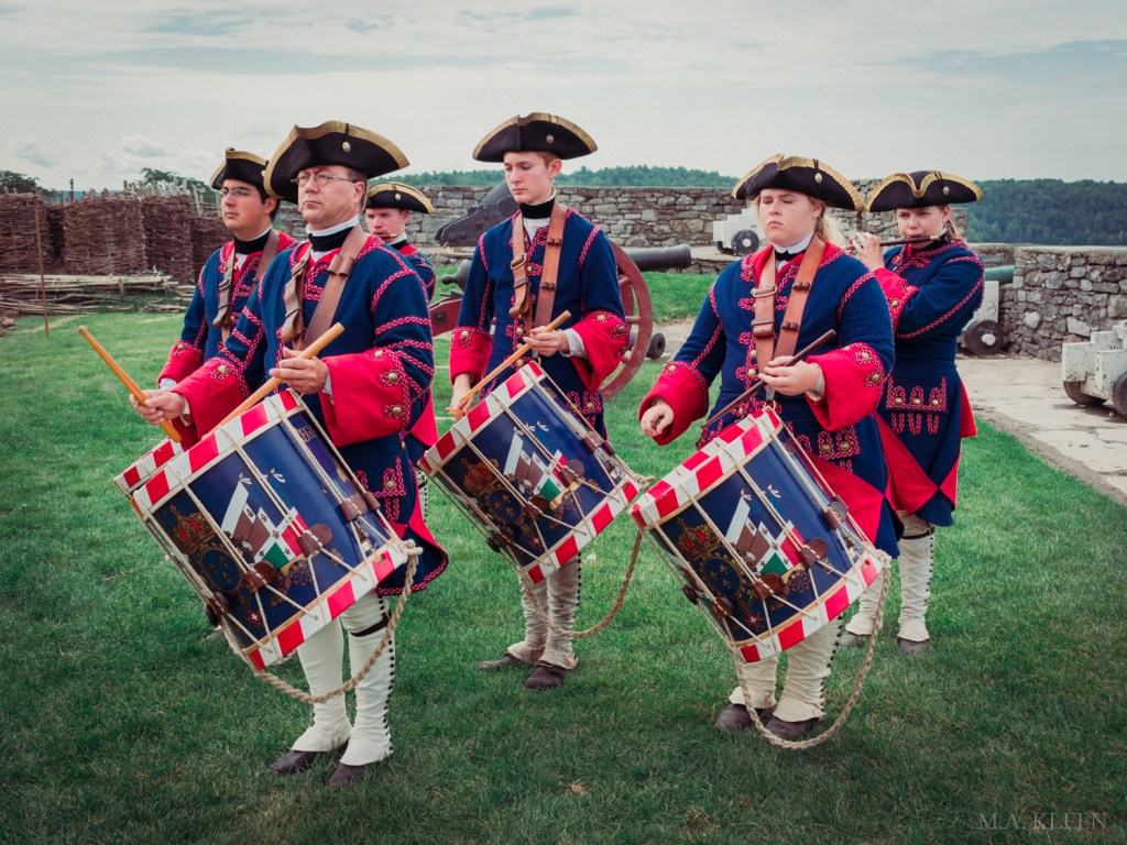 Reenactors dressed as a French fife and drum corps at Fort Ticonderoga, 102 Fort Ti Rd, in Ticonderoga, New York.